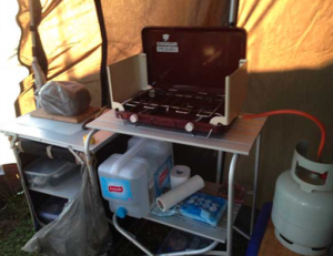 Portable Camping Kitchen Setup Ideas: The storage underneath the table